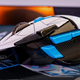 The Logitech G502 Hero mouse sits on top of a League of Legends mouse pad.